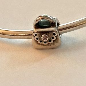 Authentic Pandora purse charm with pink stone